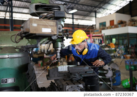 Professional men engineer worker skills quality, maintenance, training industry factory worker , warehouse Workshop for factory operators, mechanical engineering team production. 87230367