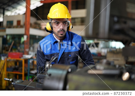 Professional men engineer worker skills quality, maintenance, training industry factory worker , warehouse Workshop for factory operators, mechanical engineering team production. 87230372