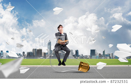 young businessman with a book 87232531