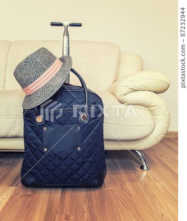 Suitcase and hat Suitcase and hat 87232944