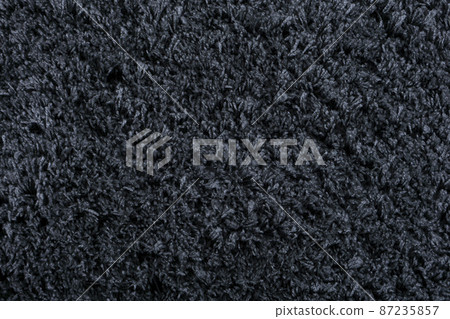 Carpet texture background. Black gray cotton carpet for floor coverings. Material for interior design and decoration of living rooms Carpet texture background. Black gray cotton carpet for floor coverings. Material for interior design and decoration of living rooms 87235857