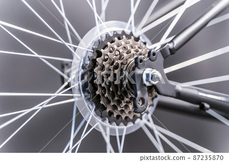 Asterisks and spokes of a bicycle. Steel structural element of the bicycle mechanism, fastening and cleaning 87235870