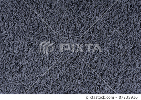 Carpet texture background. Black gray cotton carpet for floor coverings. Material for interior design and decoration of living rooms Carpet texture background. Black gray cotton carpet for floor coverings. Material for interior design and decoration of living rooms 87235910