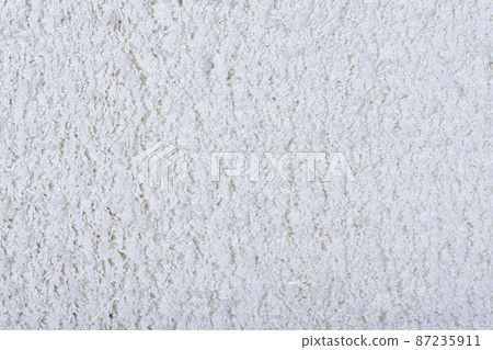 Carpet texture background. White cotton carpet for floor coverings. Material for interior design and decoration of living rooms Carpet texture background. White cotton carpet for floor coverings. Material for interior design and decoration of living rooms 87235911