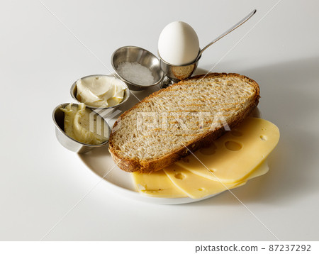 Snacks for lunch on white plate on the table Snacks for lunch on white plate on the table 87237292