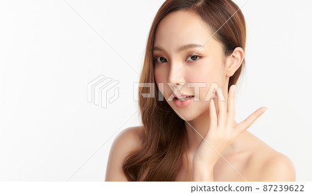 Beautiful young asian woman with clean fresh skin on white background, Face care, Facial treatment, 87239622