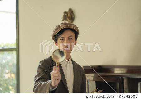 Male portrait magnifying glass Male portrait magnifying glass 87242503