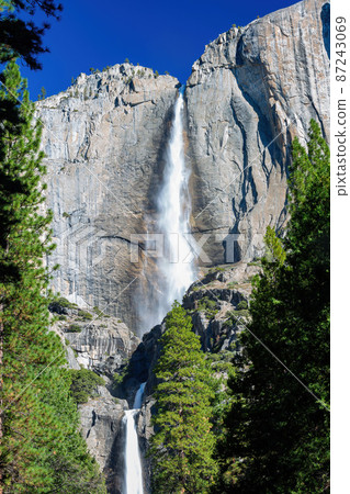 Sunny view of the upper and lower Yosemite Falls of Yosemite National Park Sunny view of the upper and lower Yosemite Falls of Yosemite National Park 87243069