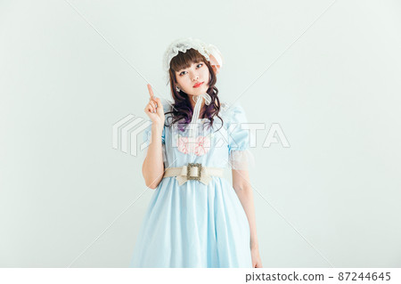 Cosplay woman with index finger Cosplay woman with index finger 87244645