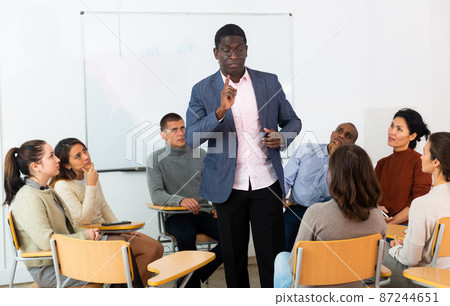 University teacher conducts lesson for students 87244651