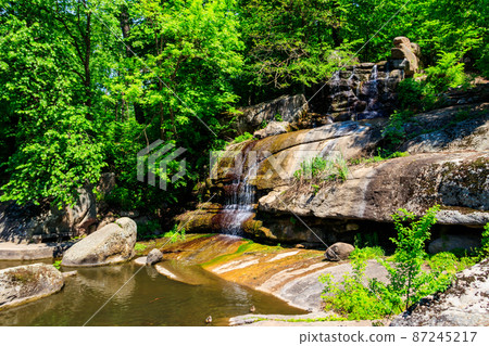 Beautiful waterfall in Sofiyivka park in Uman, Ukraine 87245217