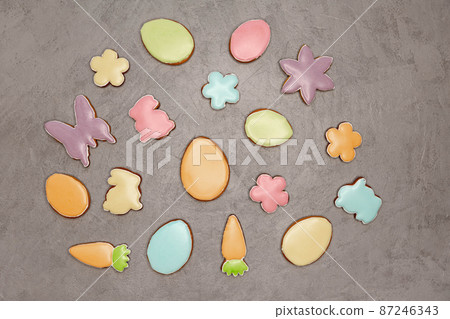 Easter decoratative composition on the grey concrete background. 87246343