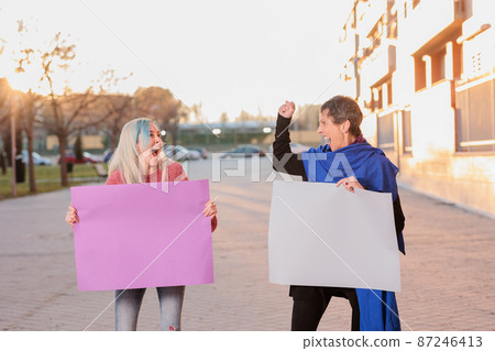feminist movement 8 march empty banner background with young Mexican and mature Hispanic women 87246413