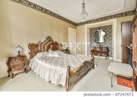 Beautiful bedroom in new luxury home with some decor 87247671