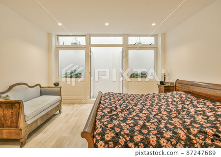 Beautiful bedroom in new luxury home with some decor 87247689