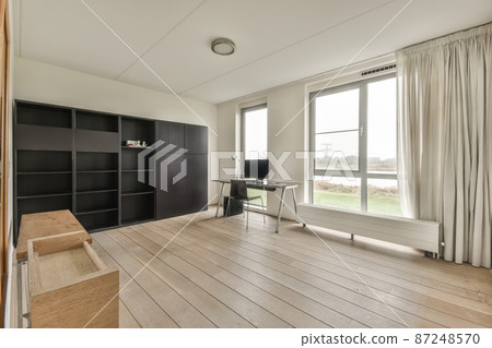 Cozy home office room in a luxury design 87248570