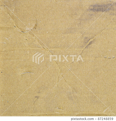 Brown and beige corrugated cardboard detail, isolated on black background Brown and beige corrugated cardboard detail, isolated on black background 87248859