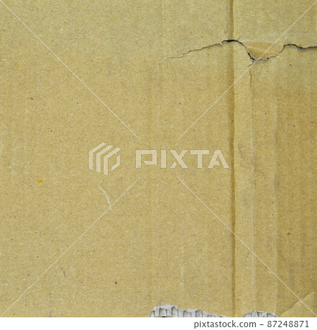 Brown and beige corrugated cardboard detail, isolated on black background Brown and beige corrugated cardboard detail, isolated on black background 87248871