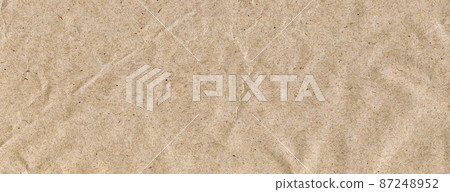 Brown and beige cardboard detail, cardboard paper texture as background Brown and beige cardboard detail, cardboard paper texture as background 87248952
