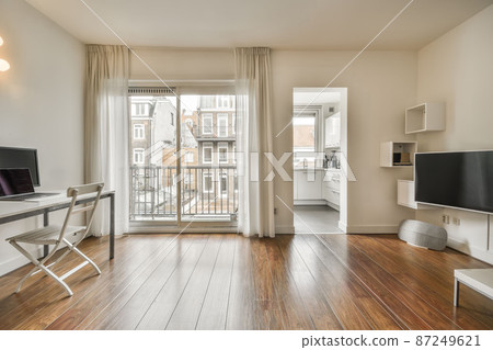 interior spacious work area with access to the balcony interior spacious work area with access to the balcony 87249621