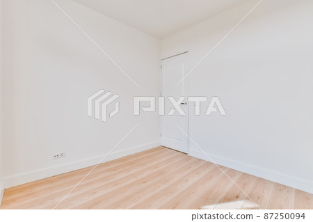 A stylish and spacious room in a modern house 87250094