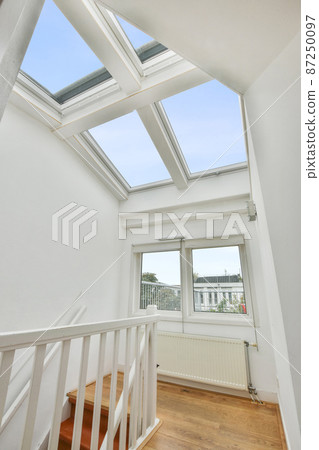 Luxury staircase hall of special design in an elegant house Luxury staircase hall of special design in an elegant house 87250097