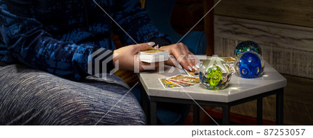 Blurred Tarot cards layout on witch table.Fortune telling and astrology, 87253057