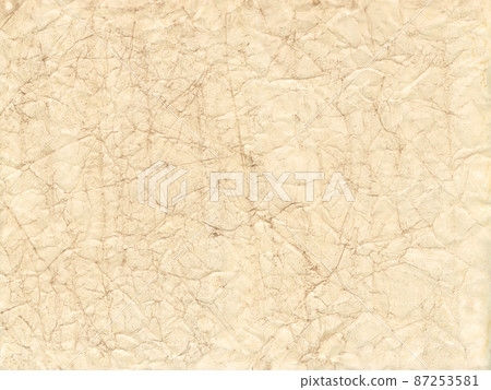 Old brown crumpled paper texture background 87253581
