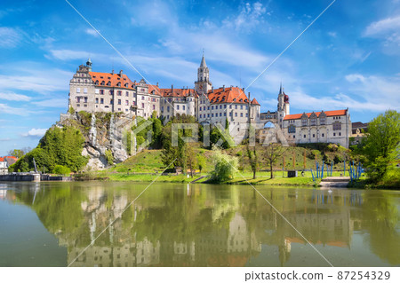 Sigmaringen castle on side of Danube river 87254329