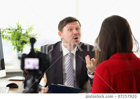 Man making interview with politician 87257920