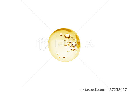 Drop of cosmetic cream, serum with transparent gel texture with micro bubble on white background 87258427