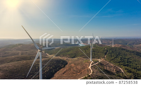Aerial view wind turbine eco friendly renewable energy concept on Portuguese mountains background. Sunny day 87258538
