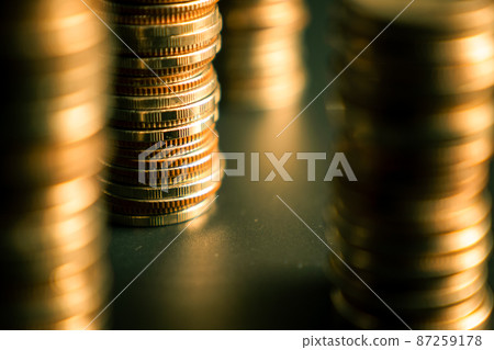 Pile of gold coins money stack in finance treasury deposit bank account saving Pile of gold coins money stack in finance treasury deposit bank account saving 87259178