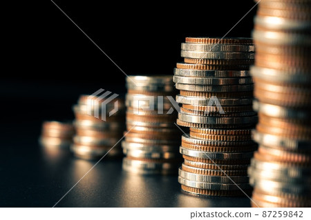 Pile of gold coins money stack in finance treasury deposit bank account saving 87259842