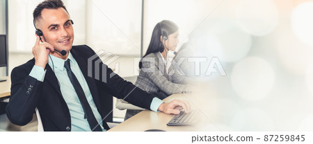Business people wearing headset working in office broaden view 87259845