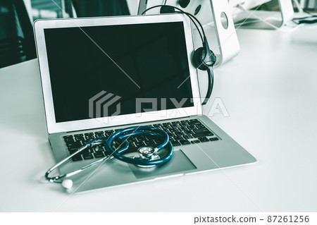 Headset and doctor equipment at clinic ready for actively support for patient Headset and doctor equipment at clinic ready for actively support for patient 87261256