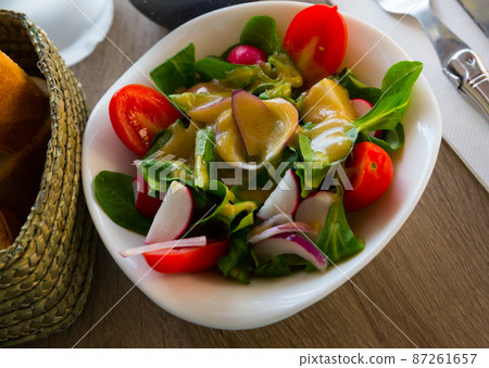 Dietary salad with tomatoes, greens Dietary salad with tomatoes, greens 87261657