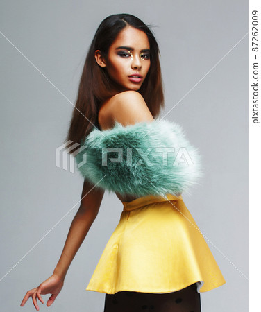 young pretty african-american woman posing in fashion clothers emotional, lifestyle people concept 87262009