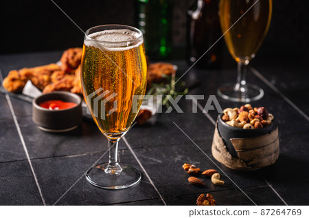 Glass of light beer 87264769