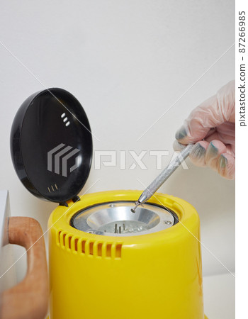 piercings on an ear. Conch and helix piercings close up. 87266985