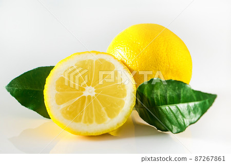 Ripe yellow lemon on white background. Antioxidant for healthy diet. Ripe yellow lemon on white background. Antioxidant for healthy diet. 87267861