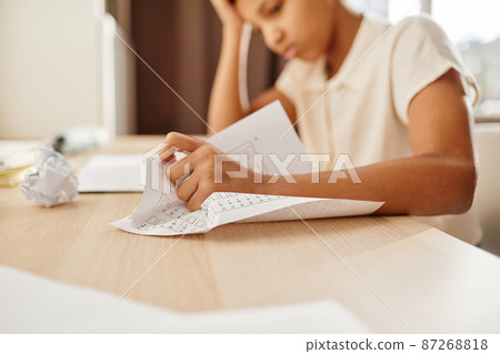 Stressed Child Crumpling Paper 87268818