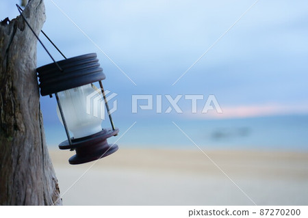 Lantern hung on a tree Lantern hung on a tree 87270200