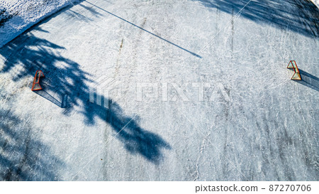 High above a outdoors ice arena High above a outdoors ice arena 87270706