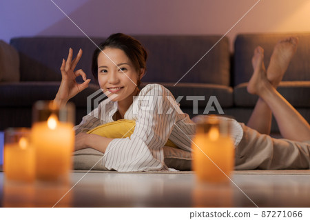 A woman relaxing at home 87271066