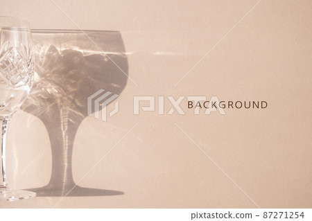 Crystal wine glass with shadow and copy space 87271254