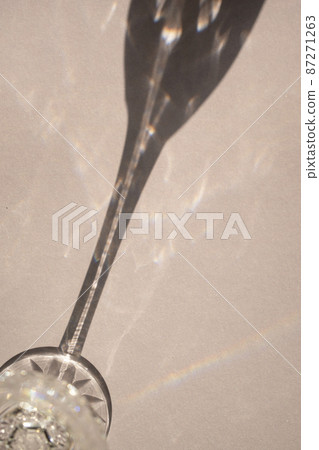 Crystal wine glass with shadow and copy space 87271263