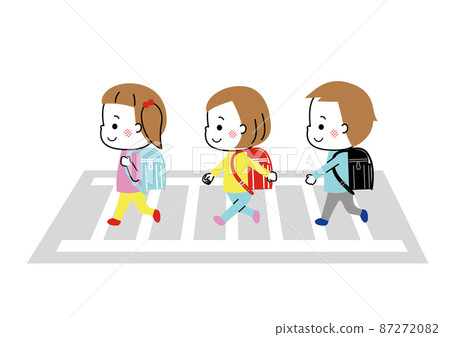 Three elementary school students crossing the pedestrian crossing with a school bag on their backs 87272082
