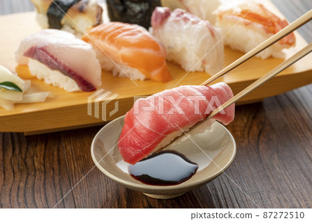 Nigiri sushi served on a plate 87272510