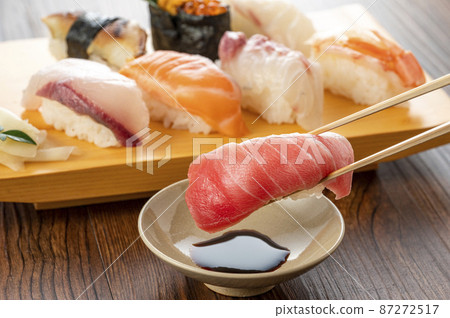Nigiri sushi served on a plate 87272517